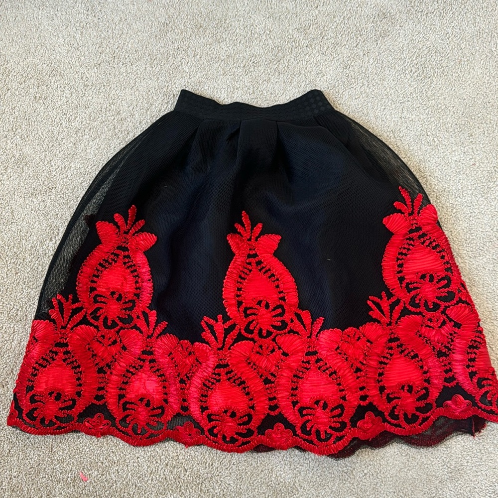 Black skirt with details